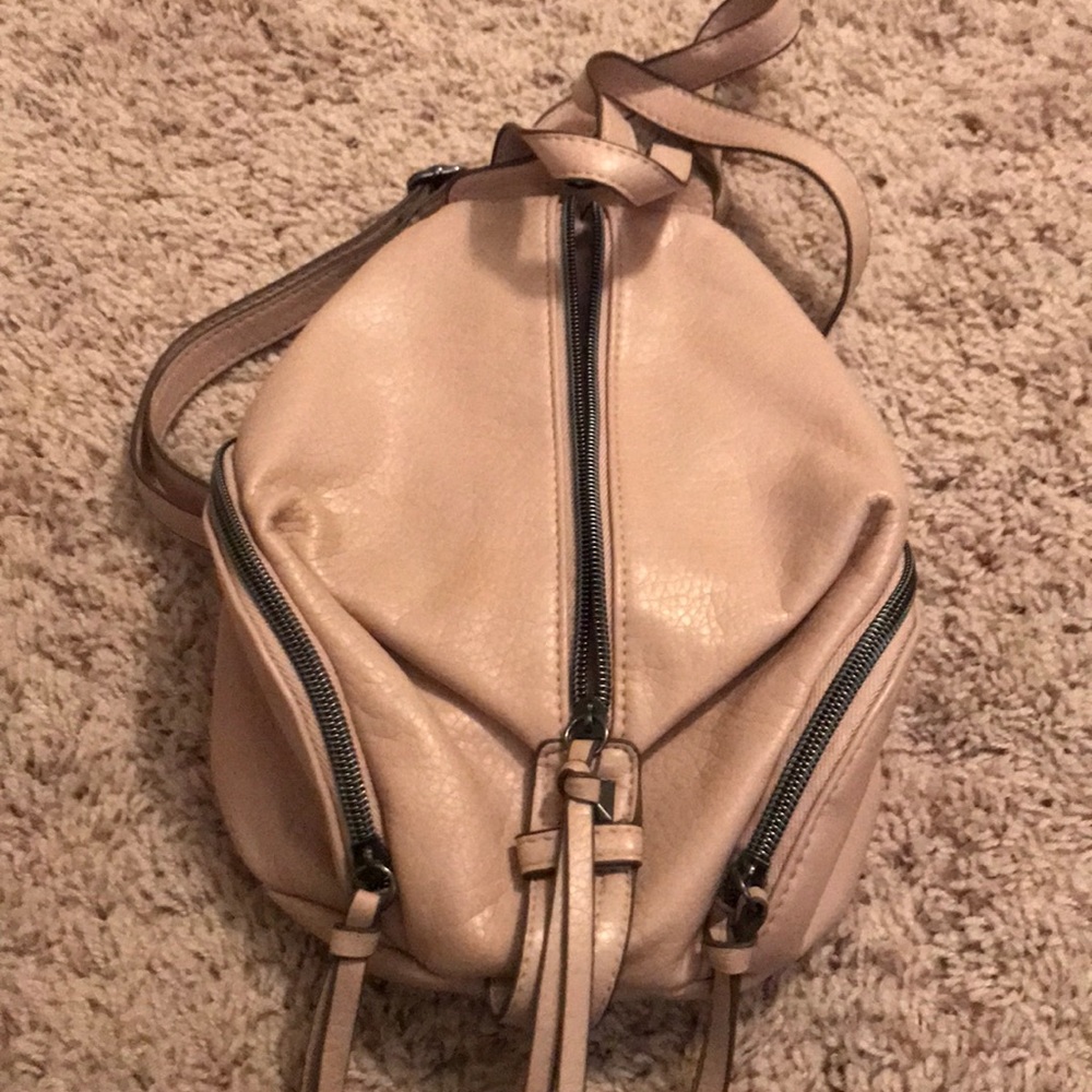 Pink leather backpack purse